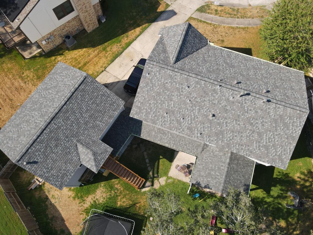 Homes in houston with a residential roof replacement